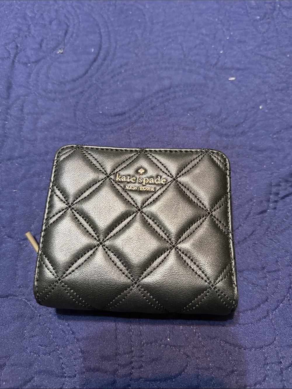 kate spade Black Quilted Leather Zip-Around Wallet with Gold Logo